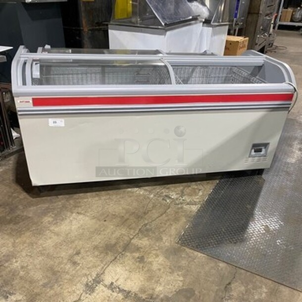 2016 AHT Chest Freezer Merchandiser! Model Manhattan210VS Serial 34990700000059! 110-120V 1Phase! With Baskets! One Glass Door Missing! On Legs!
 - Image 1 of 9