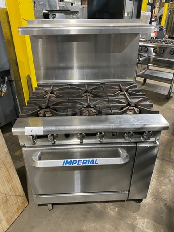 Imperial Commercial Natural Gas Powered 6 Burner Stove! With Raised Back Splash And Salamander Shelf! With Oven Underneath! All Stainless Steel! On Casters! - Image 1 of 10