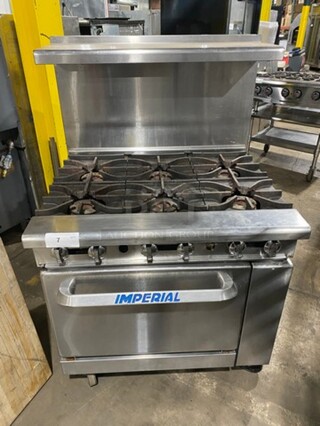 Imperial Commercial Natural Gas Powered 6 Burner Stove! With Raised Back Splash And Salamander Shelf! With Oven Underneath! All Stainless Steel! On Casters!