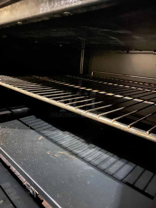 SWEET! Imperial Commercial Natural Gas Powered 6 Burner Stove With Left Side Flat Top Griddle! 2 Full Size Ovens Underneath! With Metal Oven Racks! Left Side Splash And Raised Back Splash! All Stainless Steel! On Casters! - Image 10 of 11
