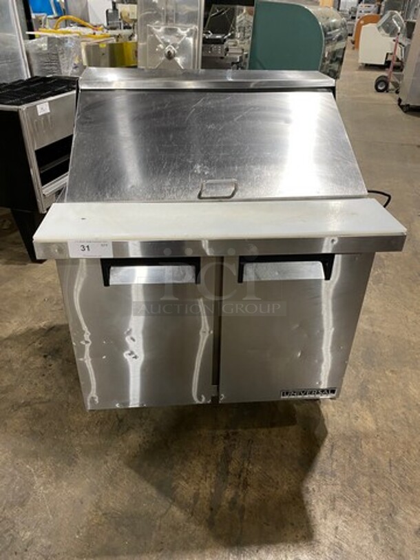 Universal Coolers Commercial Refrigerated Sandwich Prep Table! With Commercial Cutting Board! With 2 Door Storage Space Underneath! With Poly Coated Rack! All Stainless Steel! On Casters!