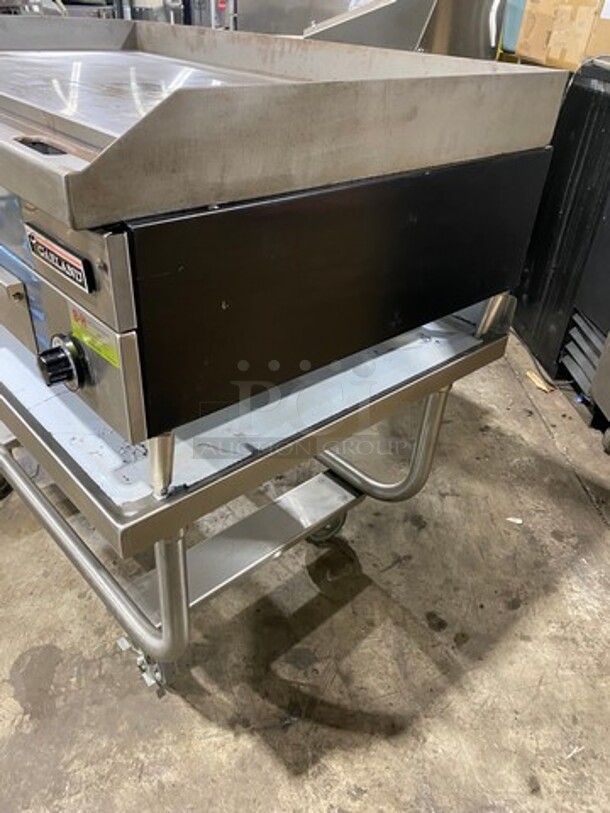 WOW! NEW OUT OF THE BOX! Garland Commercial Countertop Electric Powered Flat Top Griddle! With Back And Side Splashes! On Legs! On Equipment Stand! All Stainless Steel! On Casters! Model: E2448G SN: 0404ME0033 208V 60HZ 3 Phase - Image 2 of 10