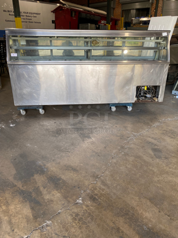 Commercial Refrigerated Deli Display Case Merchandiser! With Slanted Front Glass! With 4 View Through Sliding Rear Access Doors! With 5 Door Storage Space Underneath! All Stainless Steel!
