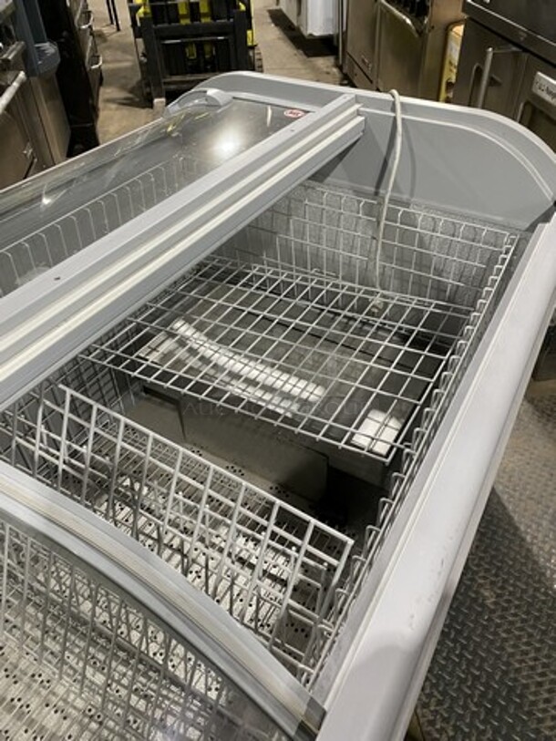 2016 AHT Chest Freezer Merchandiser! Model Manhattan210VS Serial 34990700000059! 110-120V 1Phase! With Baskets! One Glass Dor Missing! On Legs!  - Image 6 of 10