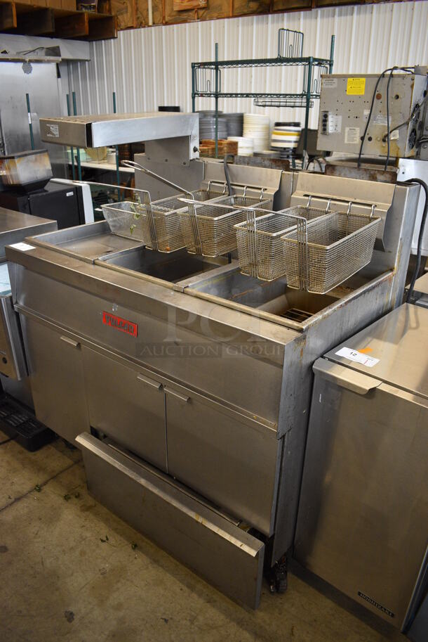 Vulcan Stainless Steel Commercial Natural Gas Powered 2 Bay Deep Fat Fryer w/ Left Side Dumping Station, Filtration System on Commercial Casters. 47x31x53