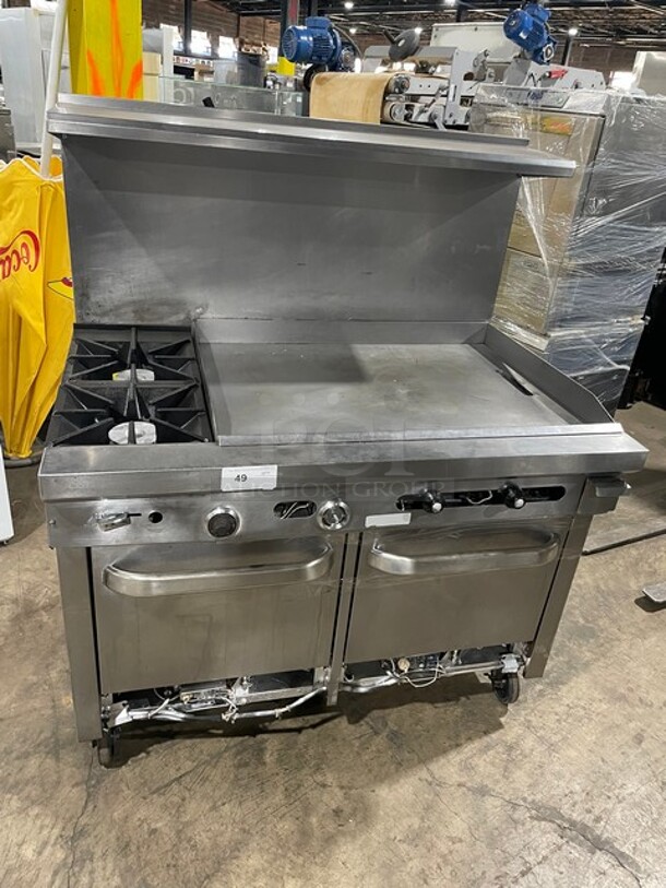 Nice! All Stainless Steel Natural Gas Powered Combo Range! 2 Burner With 36 Inch Flat Top  Griddle! With Two Ovens Underneath! On Commercial Casters! - Image 1 of 10