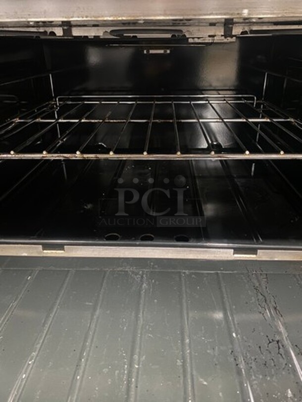 NICE! Garland Commercial Electric Powered Flat Griddle With Right Side Hot Plate! Griddle Has Side Splashes! With Back Splash! With Oven Underneath! All Stainless Steel! On Legs! WORKING WHEN REMOVED! Model: S6861R24L SN: 0009RE087R 208V 60HZ 3 Phase - Image 7 of 12