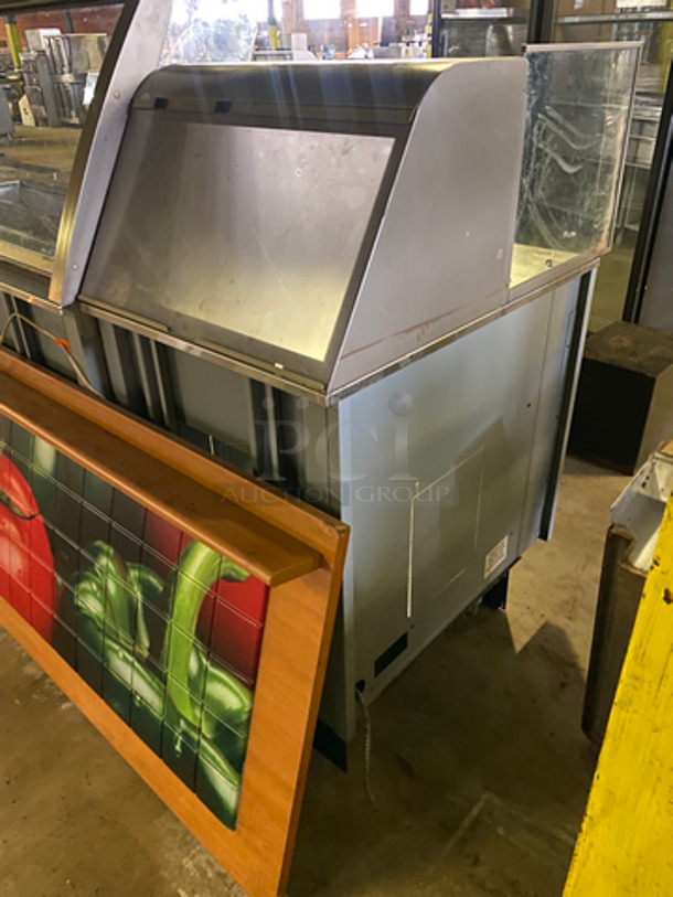 AMAZING! Duke Stainless Steel Commercial Subway Prep Line w/ Lowering Sneeze Guards. (1) Hot Well, (2) Refrigerated Prep Tables, (1) Point of Sale Station, 4 In Counter Cup Dispensers, (4) Chip Merchandisers, Credit Card Machine Mount and Rear Lower Dry Storage. Separates Into 4 Pieces! Model: SWD70060FLM SN: 10100312 120V 60HZ 1 Phase, Model: SWH70025FLM SN: 09103602 120V 60HZ 1 Phase, Model: SUBCPTC60M SN: 10100174 120V 60HZ 1 Phase - Image 2 of 12