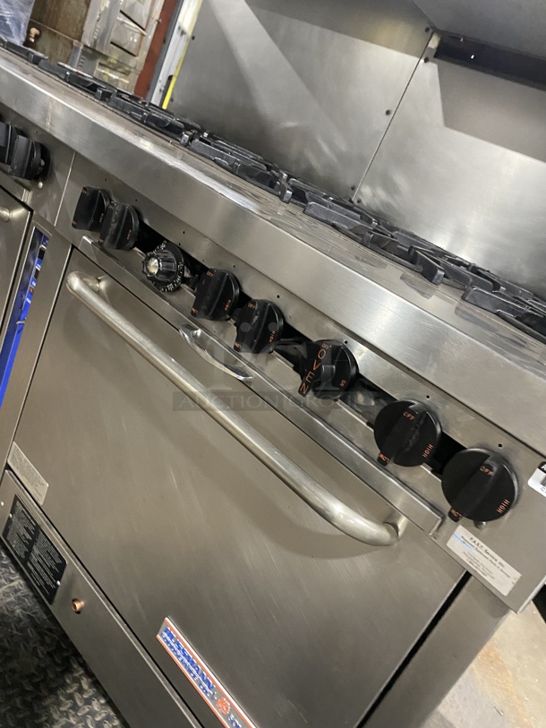 WOW! Southbend/Hussman Natural Gas Powered 12 Burner Stove! With 2 Full Sized  Ovens/One Oven With Convection! With Full Size Salamander! With Metal Oven Racks! With Raised Back Splash & Salamander! All Stainless Steel! On Casters! Working When Removed! - Image 8 of 8