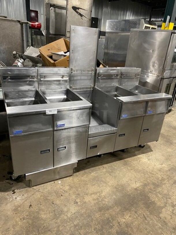 FAB! Pitco Frialator Commercial Natural Gas Powered 4 Bay Deep Fat Fryer! With Middle Fryer Basket Rack! With Oil Filter System! All Stainless Steel! On Casters! Model: SGH50 SN: G09FA015137
