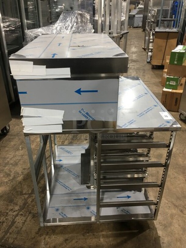 GREAT! NEW! Delfield Commercial Worktable! Stainless Steel! On Small Casters! With Built In Tray Rack Underneath!  Model: WORKTABLE SN: 1610150002301 - Image 5 of 10