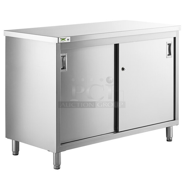 BRAND NEW SCRATCH AND DENT! Regency 600EBT2448D 24" x 48" 16 Gauge Type 304 Stainless Steel Enclosed Base Table with Sliding Doors and Adjustable Midshelf - Image 1 of 4