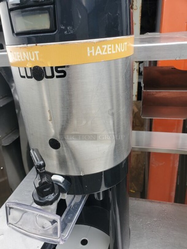 Fetco L3D-10 Luxus Thermal Dispenser
Dented on one side
 - Image 2 of 3