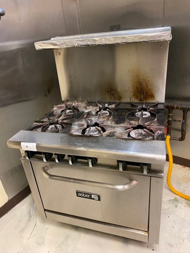 LATE MODEL! 2019 Asber Commercial Natural Gas Powered 6 Burner Stove! With Raised Back Splash And Salamander Shelf! With Oven Underneath! Metal Oven Rack! All Stainless Steel! On Casters! WORKING WHEN REMOVED! - Image 1 of 9
