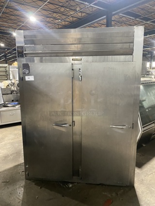 Traulsen AHF 232WP5 Stainless Steel Commercial 2 Door Reach In Heated Cabinet. 115/208 Volts, 1 Phase! Eletric powered!