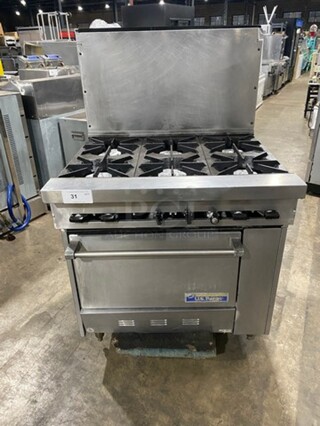 US Range Commercial Natural Gas Powered 6 Burner Stove! With Raised Back Splash! With Oven Underneath! All Stainless Steel! On Legs!