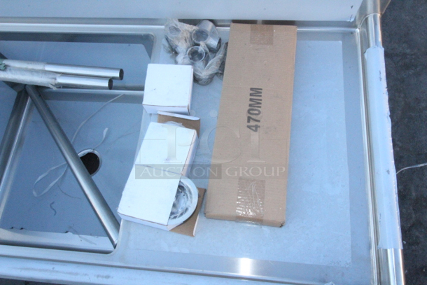 BRAND NEW SCRATCH & DENT! Regency 600S324242 124" 16-Gauge Stainless Steel Three Compartment Commercial Sink with 2 Drainboards - 24" x 24" x 14" Bowls. Appears to be missing 3 of the legs.  - Image 5 of 7
