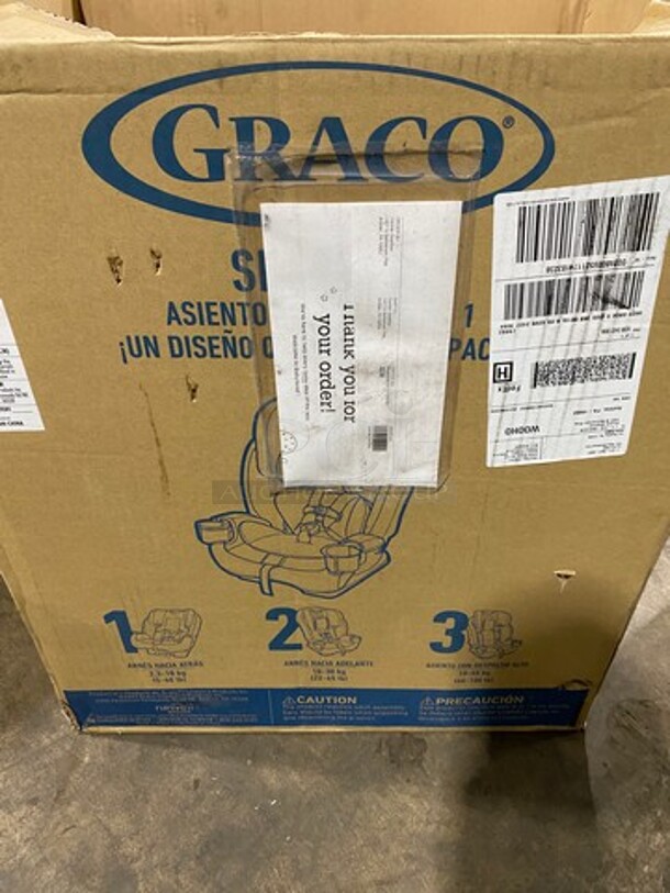 IN ORIGINAL BOX! Graco Child Safety Car Seat! With Straps! With Single Side Cup Holder! With Side Patting For Head Support! - Image 5 of 6