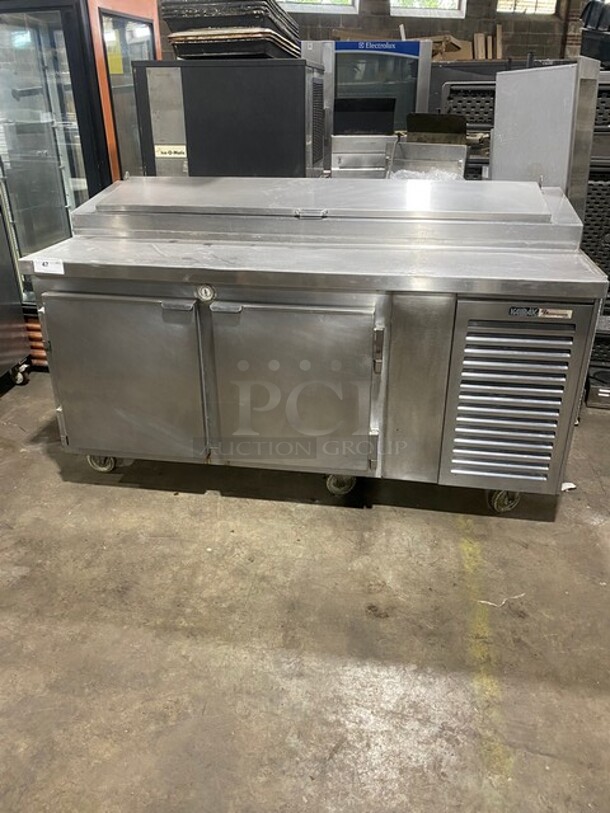 Nice! Kairak Heavy Duty Stainless Steel Pizza Prep Table With 2 Door Storage Space Underneath! On Casters! 115V 1 Phase 60HZ! On Casters!  - Image 1 of 9