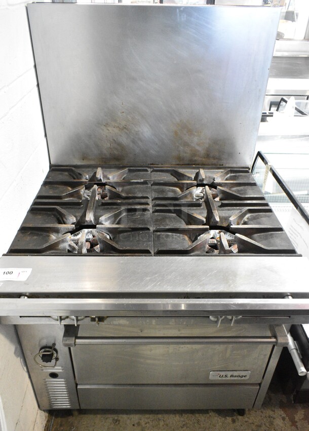 US Range C836-7 Stainless Steel Commercial Natural Gas Powered 4 Burner Range w/ Oven and Back Splash on Commercial Casters.  - Image 2 of 9