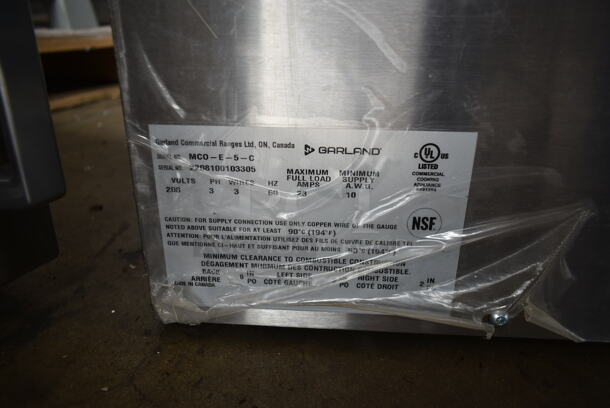 BRAND NEW SCRATCH AND DENT! 2022 Garland MCO-E-5-C Stainless Steel Commercial Electric Powered Half Size Convection Oven w/ View Through Door, Metal Oven Racks and Thermostatic Controls. 208 Volts, 3 Phase.  - Image 7 of 7