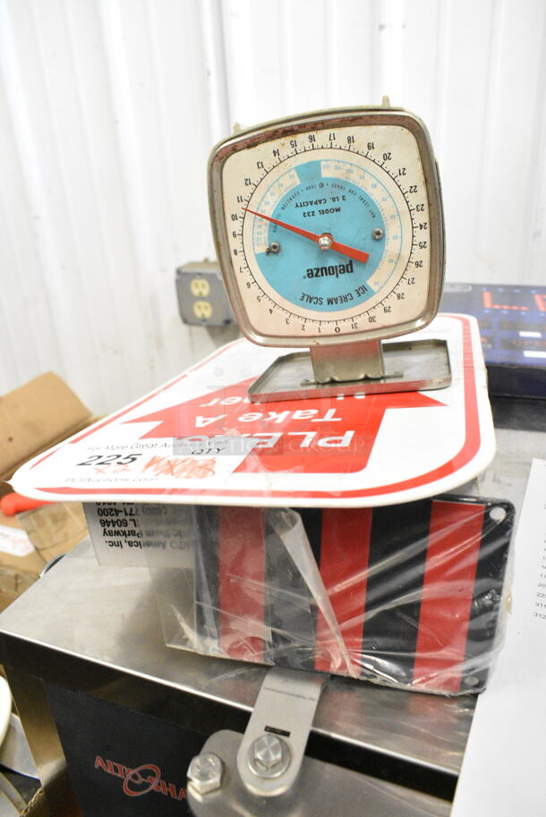 2 Various Items Including Ticket Number Dispenser w/ Number Sign, Scale. 2 Times Your Bid! - Image 1 of 6