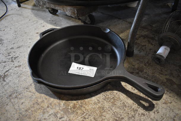 2 Cast Iron Skillets. 22.5x16x2.5. 2 Times Your Bid!