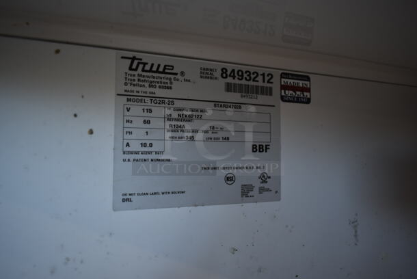 2015 True TG2R-2S ENERGY STAR Stainless Steel Commercial 2 Door Reach In Cooler w/ Poly Coated Racks on Commercial Casters. 115 Volts, 1 Phase. Tested and Working! - Image 7 of 8