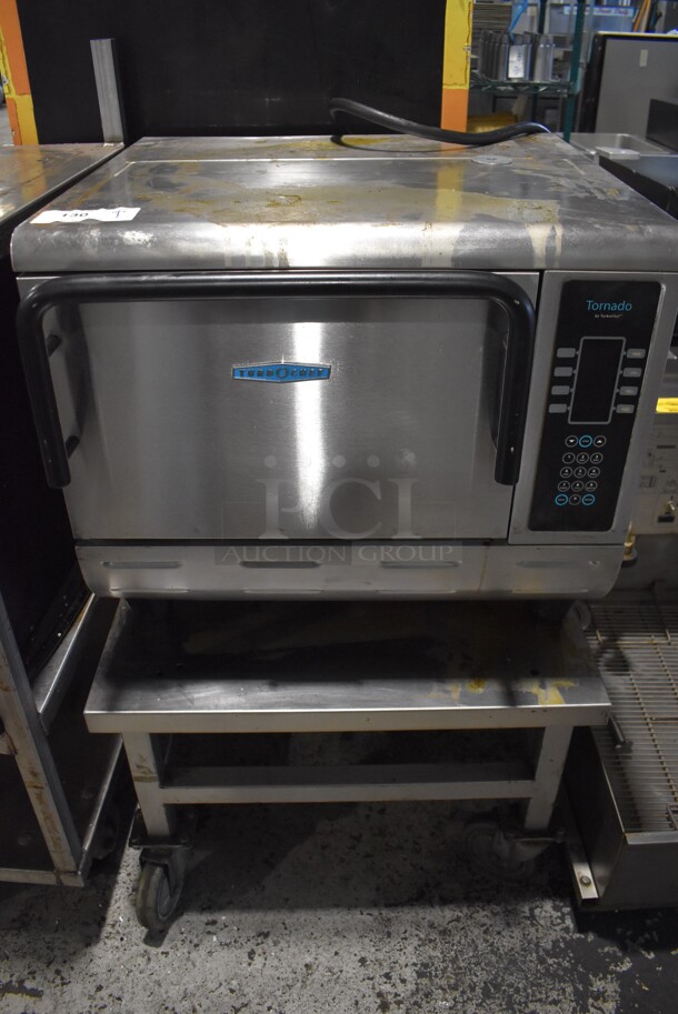 2012 Turbochef NGCD6 Stainless Steel Commercial Countertop Electric Powered Rapid Cook Oven on Stainless Steel Equipment Stand w/ Commercial Casters. 208/240 Volts, 1 Phase. 27x28x40 