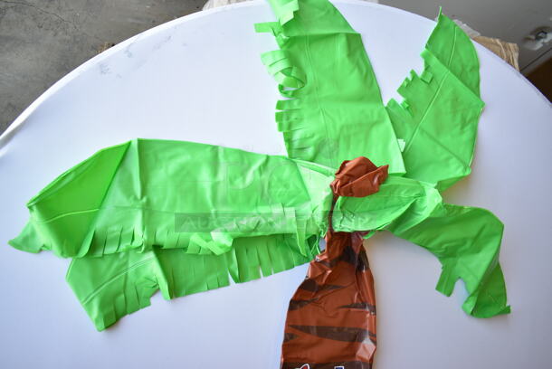 BRAND NEW! Box of Inflatable Utz Palm Trees - Image 4 of 5