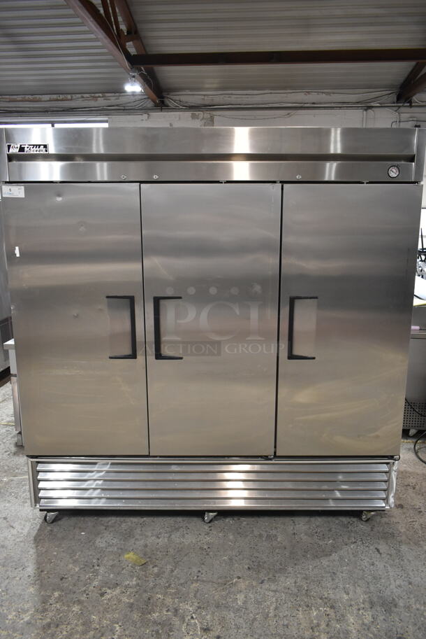 True T-72F Stainless Steel Commercial 3 Door Reach In Freezer w/ Poly Coated Racks on Commercial Casters. 115/208-230 Volts, 1 Phase.   - Image 3 of 10