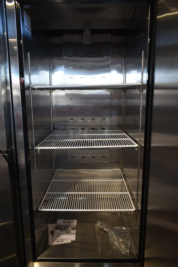 BRAND NEW SCRATCH AND DENT! 2020 Migali C-1RB-HC Stainless Steel Commercial Single Door Reach In Freezer w/ Poly Coated Racks on Commercial Casters. 115 Volts, 1 Phase. Tested and Powers On But Does Not Get Cold - Image 7 of 10