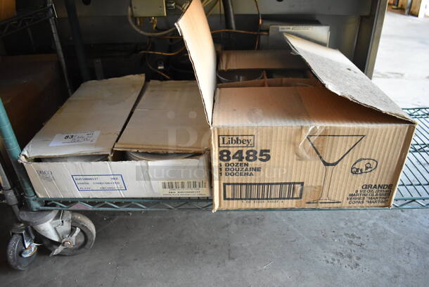 2 Boxes of BRAND NEW! Items; 12 Libbey Martini Glasses and  35 Arcadia White Ceramic Plates. Includes 7.5x7.5x0.5, 4.5x4.5x7. 2 Times Your Bid!