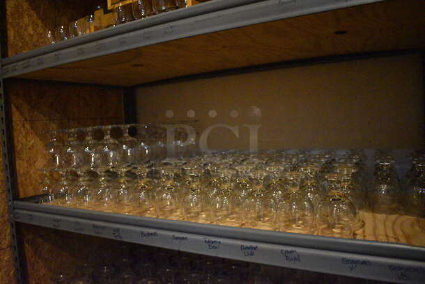 Gray Metal 5 Tier Shelving Unit w/ Contents Including Tall Glass Mugs and Wine Glasses. 48x24x72. BUYER MUST REMOVE; BUYER MUST DISMANTLE. PCI CANNOT DISMANTLE FOR SHIPPING. PLEASE CONSIDER FREIGHT CHARGES. (glass room - off of bar area) - Image 4 of 6