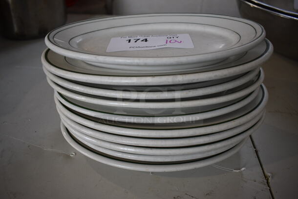 10 White Ceramic Oval Plates w/ Green Lines. Includes 10.5x7.5x1. 10 Times Your Bid!