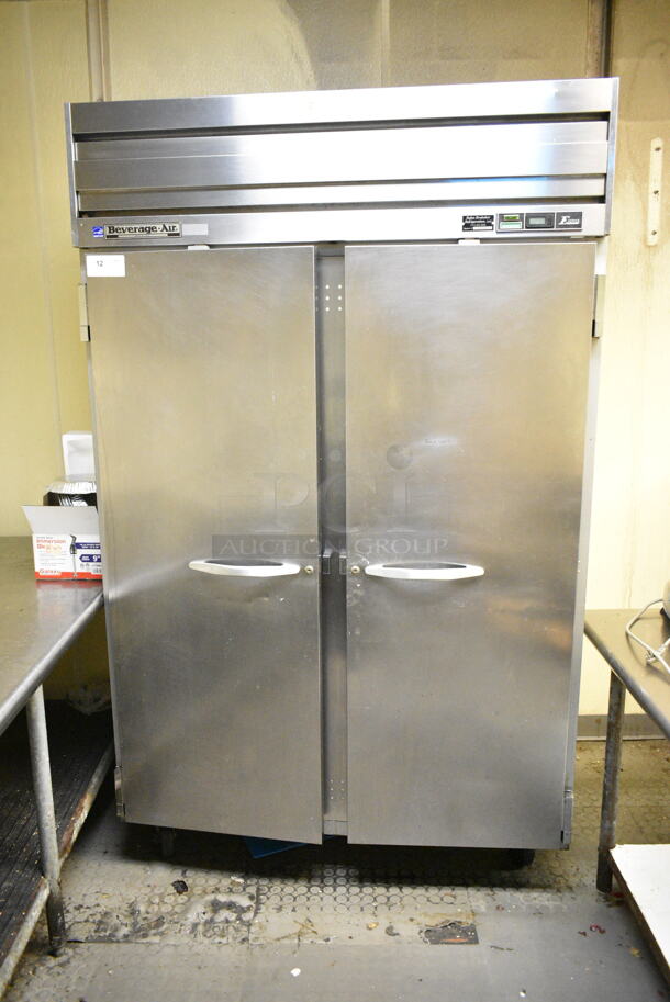 Beverage Air ER48-1AS Stainless Steel Commercial 2 Door Reach In Cooler w/ Poly Coated Racks on Commercial Casters. 115 Volts, 1 Phase. This Unit Was In Working Condition When the Restaurant Closed. (kitchen) - Image 1 of 7