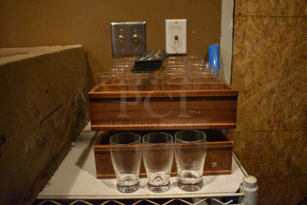 White Finish 3 Tier Wire Shelving Unit w/ Contents Including Wine Glasses. 48x18x36. BUYER MUST REMOVE; BUYER MUST DISMANTLE. PCI CANNOT DISMANTLE FOR SHIPPING. PLEASE CONSIDER FREIGHT CHARGES. (glass room - off of bar area) - Image 6 of 7
