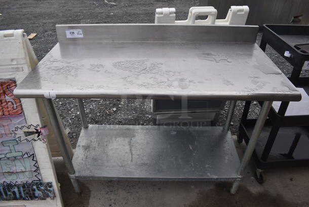Stainless Steel Commercial Table w/ Back Splash and Under Shelf. 48x24x41 - Image 1 of 4