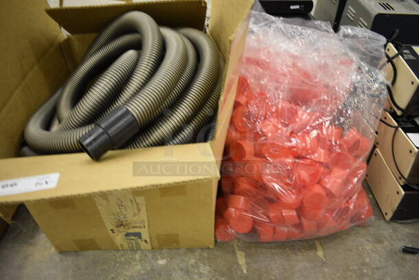 ALL ONE MONEY! Lot of Coiled Plastic Tubing and Red Circular Caps (Main Building)