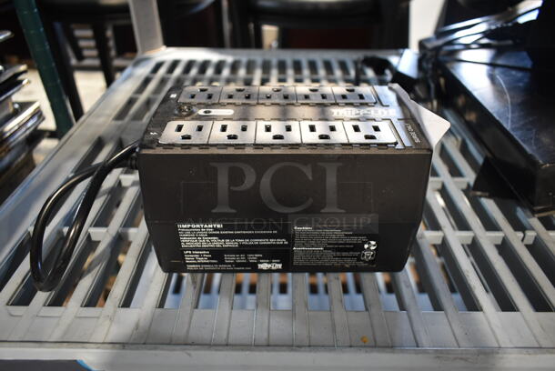 Tripp Lite Uninterruptible Power Supply. - Image 1 of 7