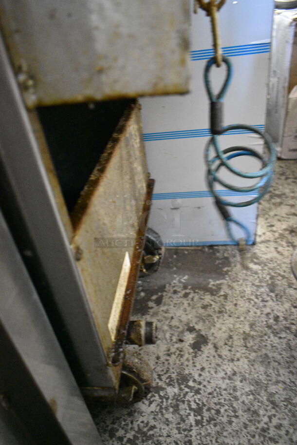 Royal Stainless Steel Commercial Natural Gas Powered Floor Style Deep Fat Fryer on Commercial Casters.  - Image 4 of 5