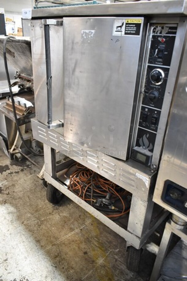 American Range Stainless Steel Commercial Propane Gas Powered Full Size Convection Oven w/ Solid Doors and Metal Oven Racks on Commercial Casters. - Image 1 of 5