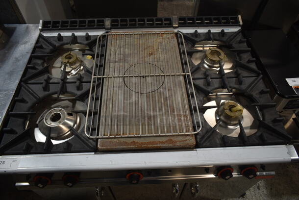 Lotus Stainless Steel Commercial Gas Powered 4 Burner Range w/ Center Burner, Under Shelf and 3 Doors. - Image 2 of 6