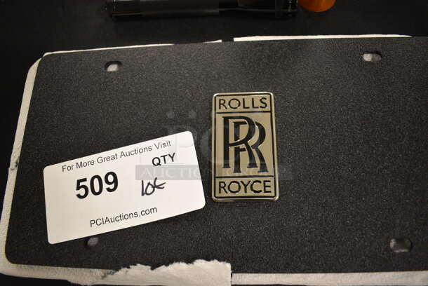 ALL ONE MONEY! Lot of Rolls Royce Items Including Clock, License Plate Cover, Cuff Links, Windshield Wiper Blades, Spirit of Ecstasy Emblem, Flash Light, Aprons, Car Parts and Mini Fuses - Image 6 of 12