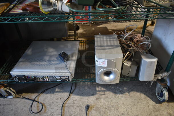 ALL ONE MONEY! Tier Lot of Various Items Including Kawasaki DVD Home Theater System.