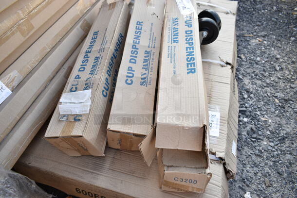 BRAND NEW SCRATCH AND DENT! All One Money! Lot of Various Items Including 2 San Jamar C3400 Cup Dispensers, 2 San Jamar C3200 Cup Dispenser, 4 Commercial Casters. 6 Poles.  - Image 5 of 7