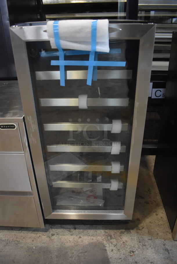 BRAND NEW SCRATCH AND DENT! Danby DWC1534BLS-1  Floor Style Black Cabinet With Glass Door Trimmed in Stainless Steel Electric Powered Built-In Wine Cooler. 115V. Tested and Working! 