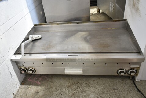 Vulcan Stainless Steel Commercial Countertop Natural Gas Powered Flat Top Griddle w/ Scraper. 