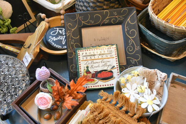 Wall Mount Table w/ Contents Including Baskets and Decor. BUYER MUST REMOVE: Bring Tools and Manpower Needed To Remove This Item. (booth room)  - Image 6 of 9