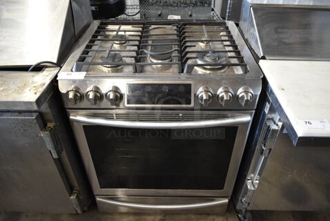 Samsung Stainless Steel Natural Gas Powered 4 Burner Range w/ Oven.